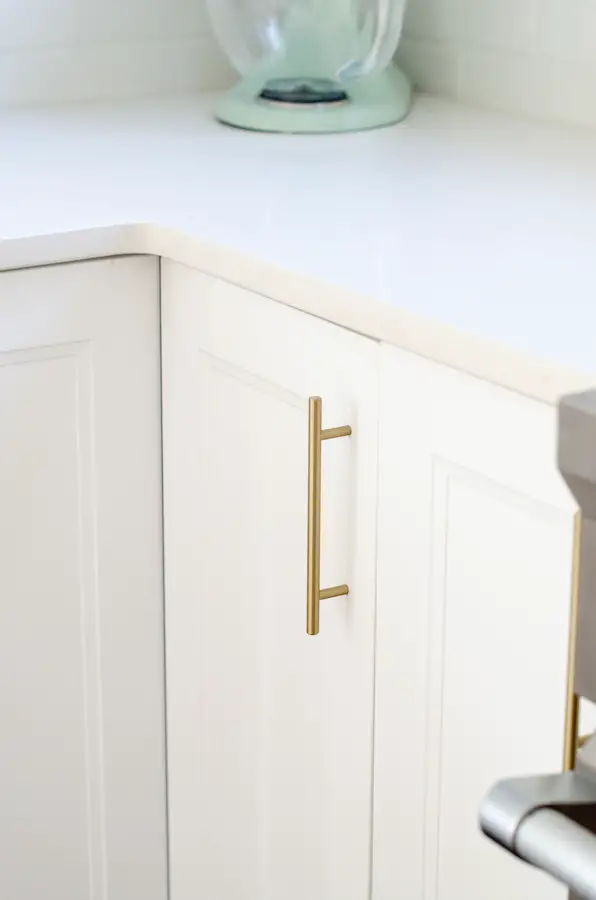 Ikea White Axstad Front Cabinets with Brass Hardware